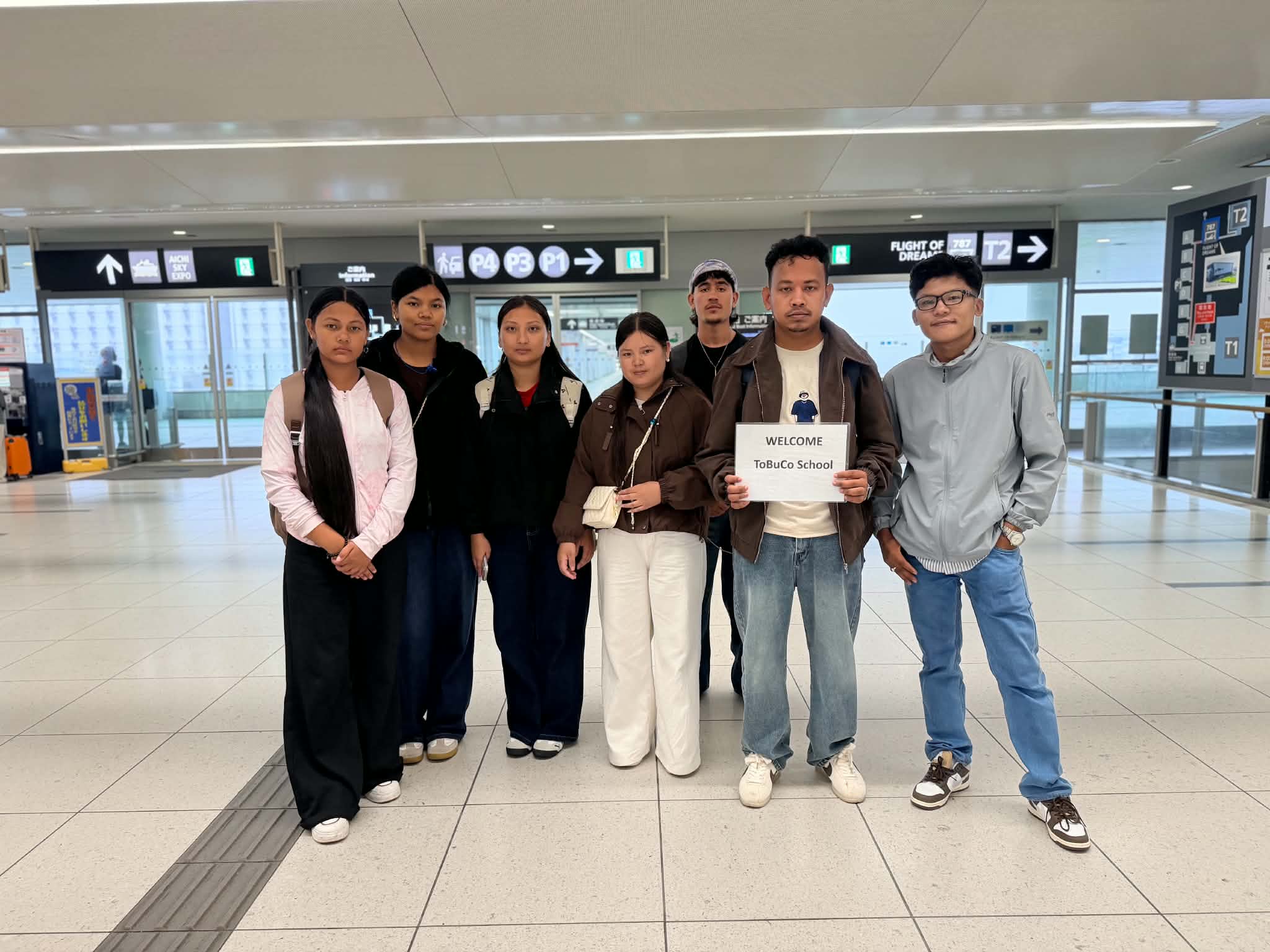 Wisdom International students at an airport in Japan