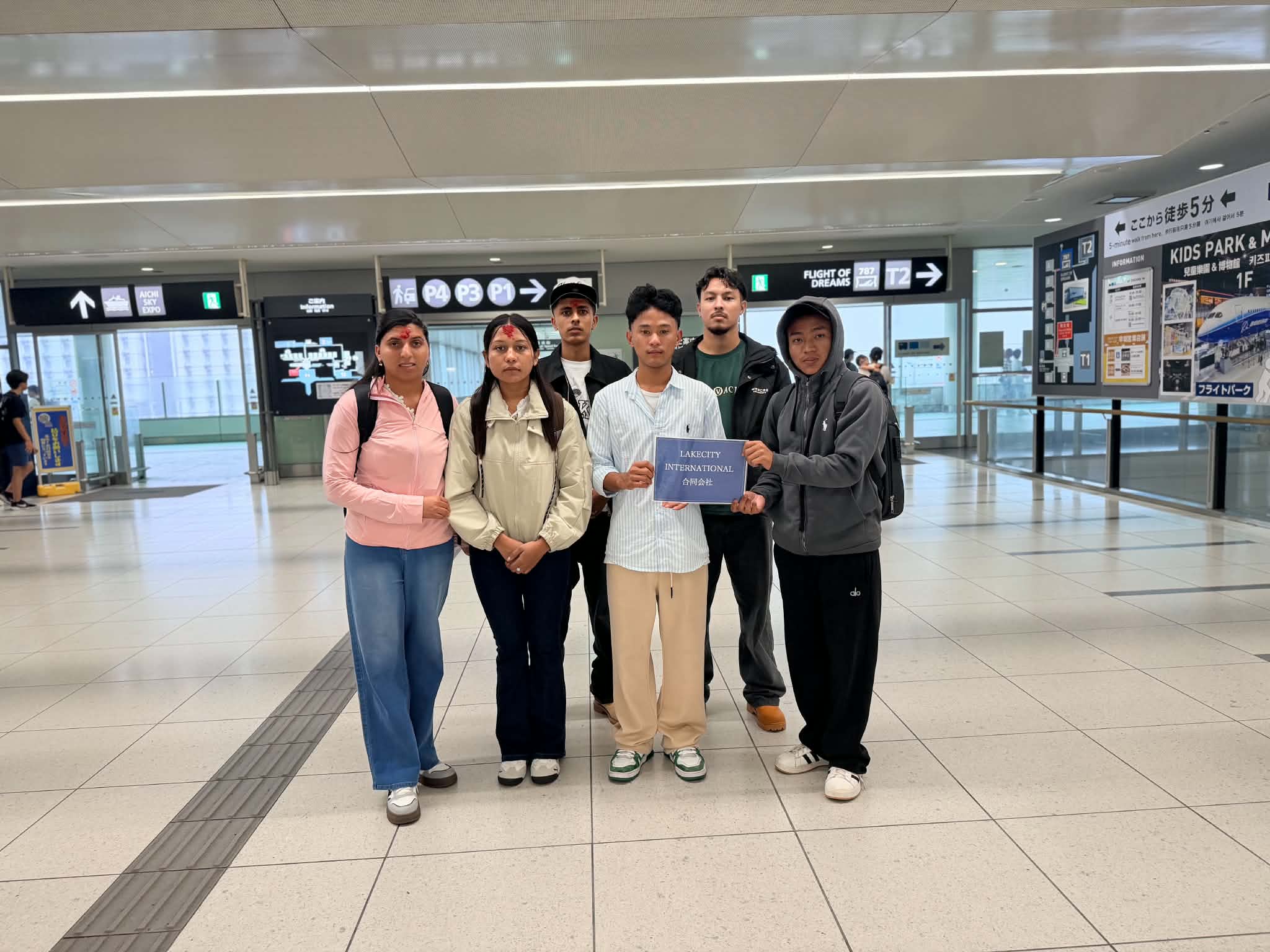 Wisdom International students at an airport in Japan